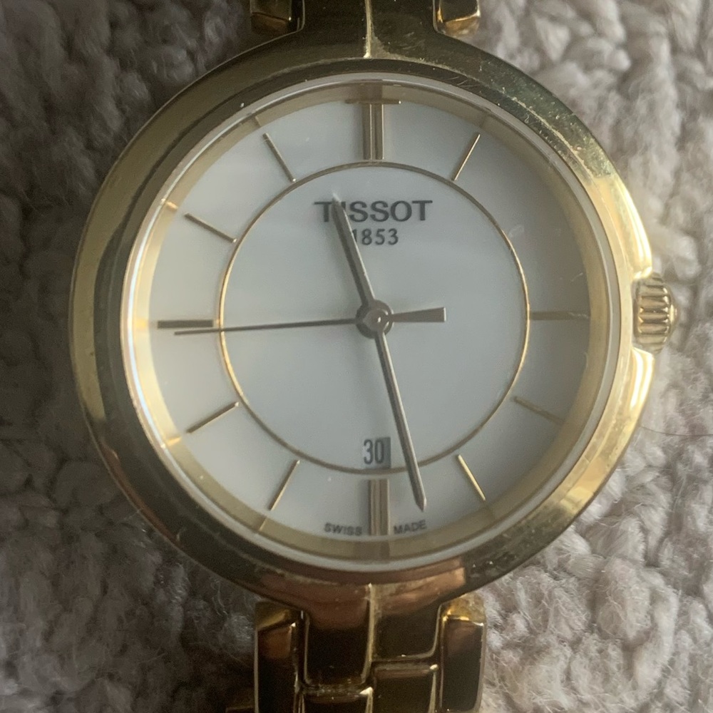 Tissot women’s watch with mother of Pearl face
